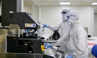 scientists with equipment