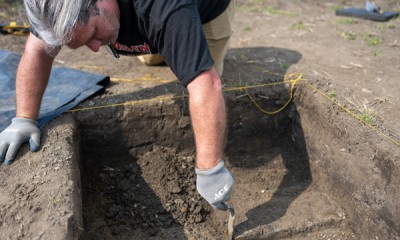 Archeologist digging at an excavation