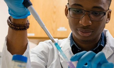 student performing a scientific experiment at Case Western Reserve University